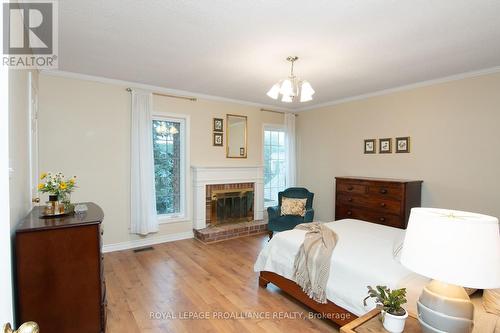 196 Country Club Drive, Kingston, ON - Indoor Photo Showing Bedroom With Fireplace