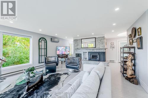 1678 South Boulevard, Kingston, ON - Indoor Photo Showing Living Room With Fireplace