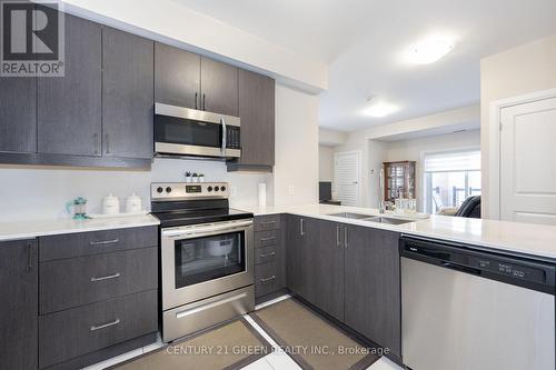 109 - 481 Rupert Avenue, Whitchurch-Stouffville, ON - Indoor Photo Showing Kitchen With Stainless Steel Kitchen With Double Sink With Upgraded Kitchen