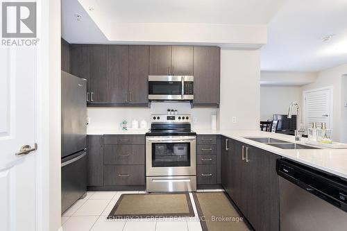 109 - 481 Rupert Avenue, Whitchurch-Stouffville, ON - Indoor Photo Showing Kitchen With Stainless Steel Kitchen With Double Sink