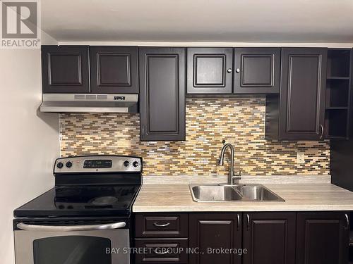 Bsmt - 15 Pynford Crescent, Toronto, ON - Indoor Photo Showing Kitchen With Double Sink