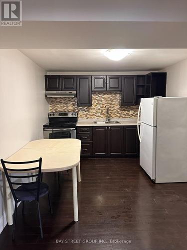 Bsmt - 15 Pynford Crescent, Toronto, ON - Indoor Photo Showing Kitchen With Double Sink