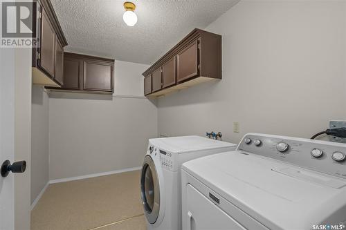 414 1580 Olive Diefenbaker Drive, Prince Albert, SK - Indoor Photo Showing Laundry Room