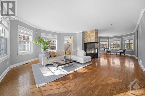 38 Marchvale Drive, Ottawa, ON - Indoor Photo Showing Living Room With Fireplace