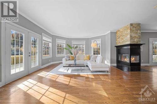 38 Marchvale Drive, Ottawa, ON - Indoor Photo Showing Living Room With Fireplace