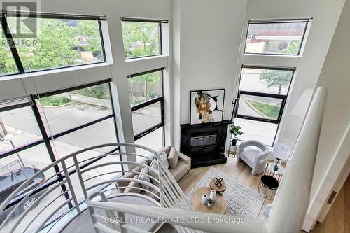 202 - 393 King Street E, Toronto, ON - Indoor Photo Showing Other Room With Fireplace