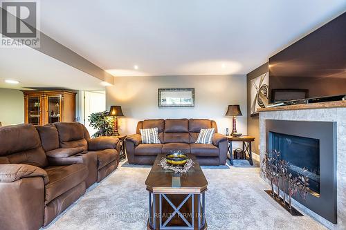 27 Milner Court, Kawartha Lakes, ON - Indoor Photo Showing Living Room With Fireplace