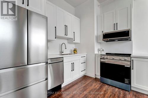 409 - 90 Colborne Street, Brantford, ON - Indoor Photo Showing Kitchen With Stainless Steel Kitchen