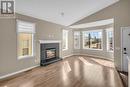 150 Lakeview Inlet, Chestermere, AB  - Indoor Photo Showing Living Room With Fireplace 