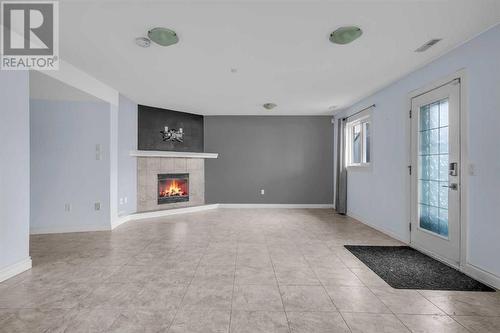 150 Lakeview Inlet, Chestermere, AB - Indoor With Fireplace