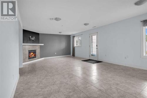 150 Lakeview Inlet, Chestermere, AB - Indoor With Fireplace