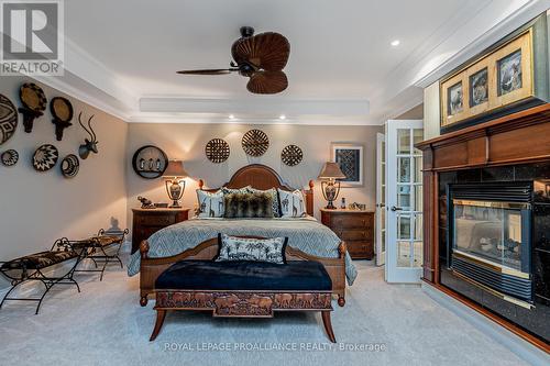 96 & 88 Spithead Road, Gananoque, ON - Indoor Photo Showing Bedroom With Fireplace