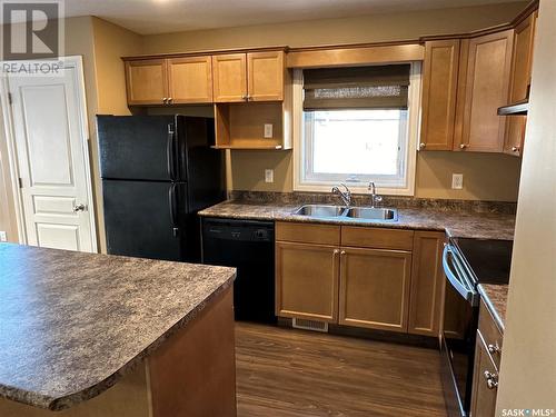 5200 7Th Avenue N, Regina, SK - Indoor Photo Showing Kitchen With Double Sink