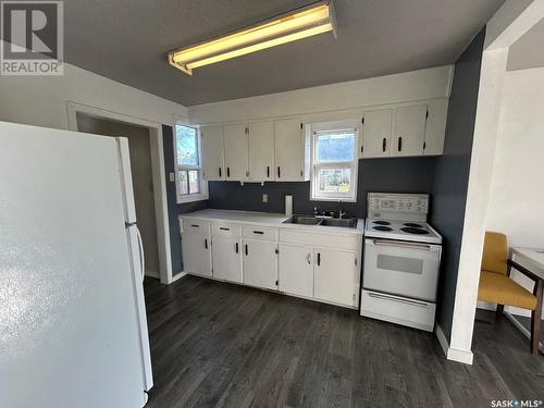 155 Broad Street, Regina, SK - Indoor Photo Showing Kitchen With Double Sink