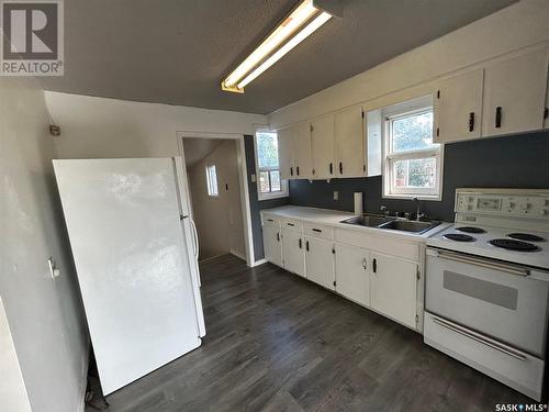 155 Broad Street, Regina, SK - Indoor Photo Showing Kitchen With Double Sink