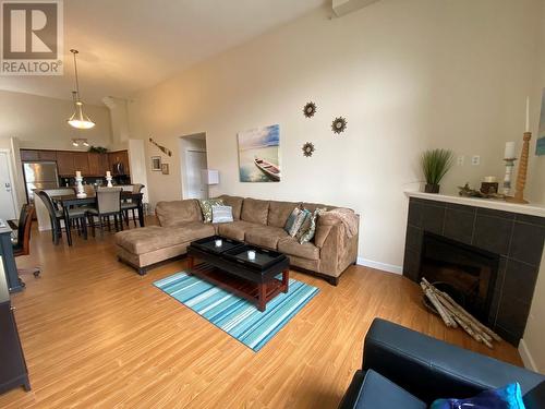 205 Third Avenue Unit# 1416, Invermere, BC - Indoor Photo Showing Living Room With Fireplace