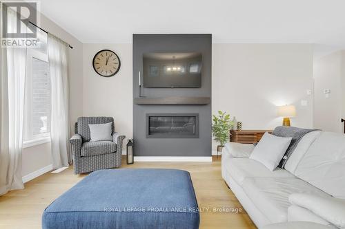 18 Athabaska Drive, Belleville, ON - Indoor Photo Showing Living Room With Fireplace