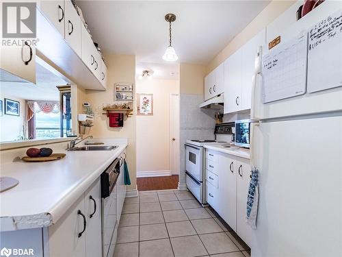 4185 Shipp Drive Unit# 1117, Mississauga, ON - Indoor Photo Showing Kitchen With Double Sink