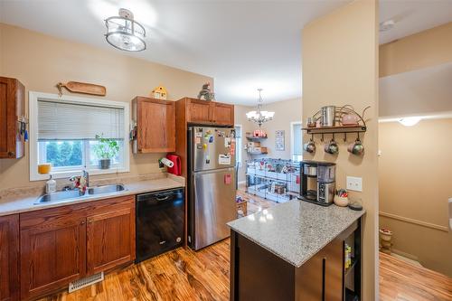 101-48 Galt Avenue, Penticton, BC - Indoor Photo Showing Kitchen With Double Sink