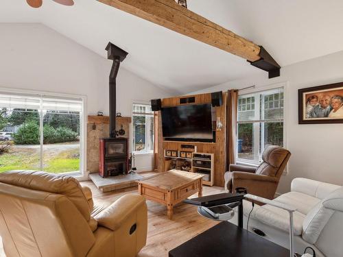 Living room - 1145 Av. Des Sapins, Stukely-Sud, QC - Indoor Photo Showing Living Room With Fireplace