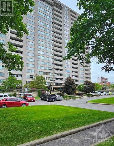 There are so many beautiful gardens and sitting areas around this building and surrounding property.  Concrete repairs are under way but it will be back to awesome soon. - 2625-501 Regina Street, Ottawa, ON - Outdoor With Facade