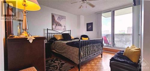 The master bedroom is quite large at 11x13 feet and it has its own 2 piece ensuite. This room has the entrance to the balcony. - 2625-501 Regina Street, Ottawa, ON - Indoor Photo Showing Bedroom