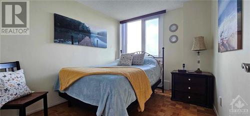 This home is an outside corner unit so the second bedroom also has its own window and a different view. The sun just pours in, in the late afternoon. - 2625-501 Regina Street, Ottawa, ON - Indoor Photo Showing Bedroom