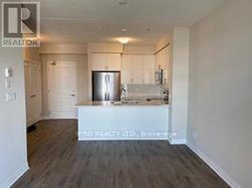 621 - 610 Farmstead Drive, Milton, ON - Indoor Photo Showing Kitchen