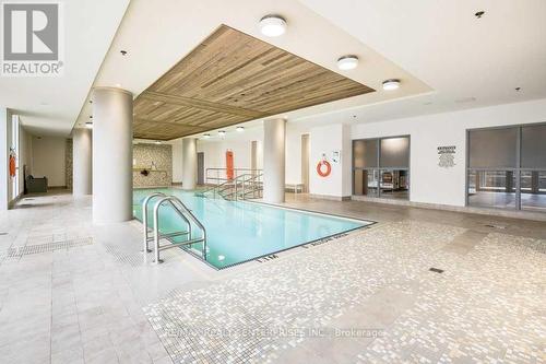 1303 - 1055 Southdown Road, Mississauga, ON - Indoor Photo Showing Other Room With In Ground Pool