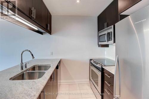 1303 - 1055 Southdown Road, Mississauga, ON - Indoor Photo Showing Kitchen With Stainless Steel Kitchen With Double Sink With Upgraded Kitchen