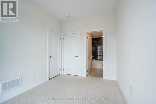 13 - Ll - 2273 Turnberry Road, Burlington, ON - Indoor Photo Showing Other Room