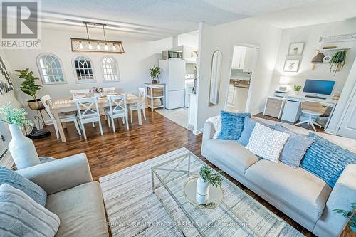 101 - 49 Queen Street E, Mississauga, ON - Indoor Photo Showing Living Room