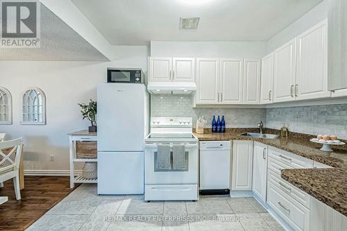 101 - 49 Queen Street E, Mississauga, ON - Indoor Photo Showing Kitchen