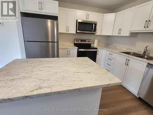 95 Whitcomb Crescent E, Smiths Falls, ON - Indoor Photo Showing Kitchen With Double Sink