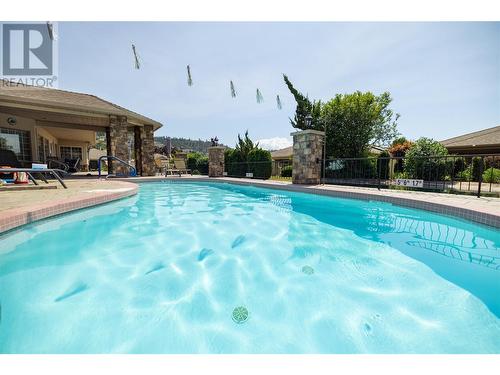 595 Yates Road Unit# 75, Kelowna, BC - Outdoor With In Ground Pool With Backyard