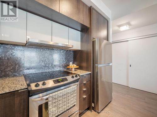 413 - 5005 Harvard Road E, Mississauga, ON - Indoor Photo Showing Kitchen