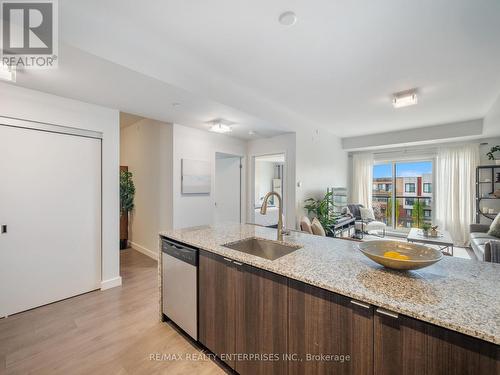 413 - 5005 Harvard Road E, Mississauga, ON - Indoor Photo Showing Kitchen