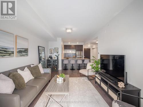 413 - 5005 Harvard Road E, Mississauga, ON - Indoor Photo Showing Living Room