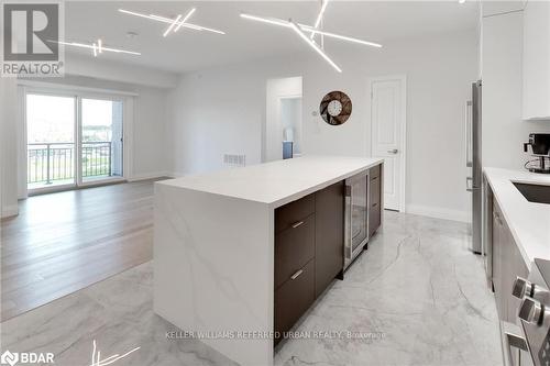 309 - 295 Cundles Road E, Barrie, ON - Indoor Photo Showing Kitchen