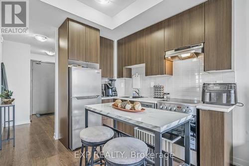 404 - 20 Orchid Place Drive, Toronto, ON - Indoor Photo Showing Kitchen