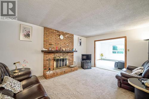 1076 Huntingwood Drive, Toronto, ON - Indoor Photo Showing Living Room With Fireplace