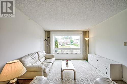 1076 Huntingwood Drive, Toronto, ON - Indoor Photo Showing Living Room