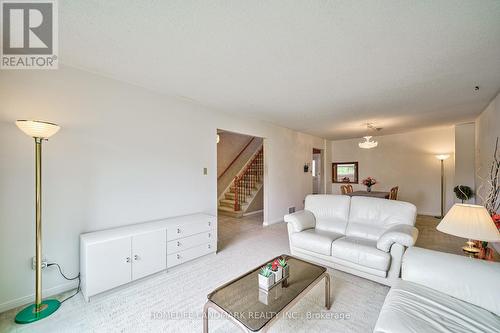 1076 Huntingwood Drive, Toronto, ON - Indoor Photo Showing Living Room