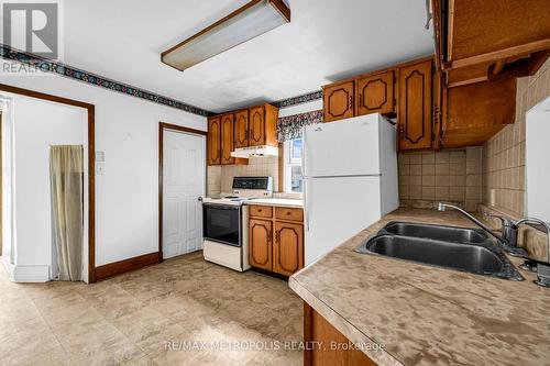 97 N Woodrow Boulevard, Toronto, ON - Indoor Photo Showing Kitchen With Double Sink