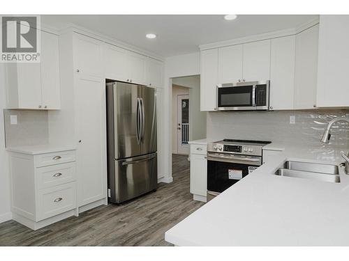 9685 Mossman Road, Prince George, BC - Indoor Photo Showing Kitchen With Double Sink