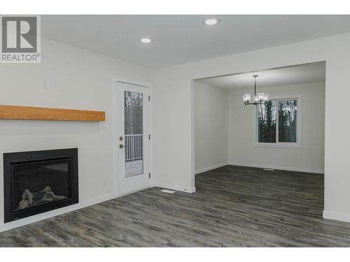 9685 Mossman Road, Prince George, BC - Indoor Photo Showing Living Room With Fireplace