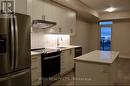 514 - 3200 William Coltson Avenue, Oakville, ON  - Indoor Photo Showing Kitchen 