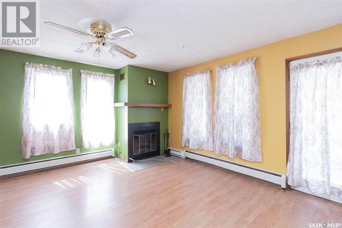 234 Heise Crescent, Saskatoon, SK - Indoor Photo Showing Other Room With Fireplace