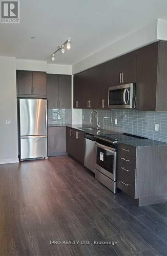 710 - 4085 Parkside Village Drive W, Mississauga, ON - Indoor Photo Showing Kitchen With Stainless Steel Kitchen