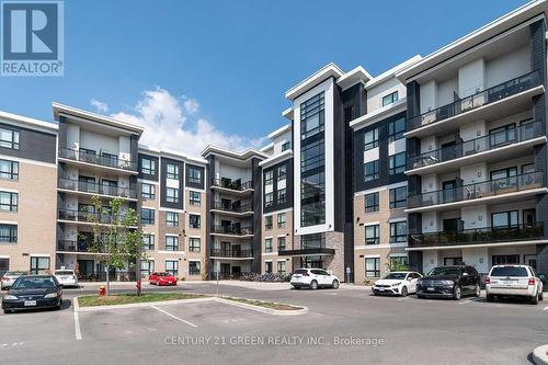 110 - 640 Sauve Street S, Milton, ON - Outdoor With Balcony With Facade